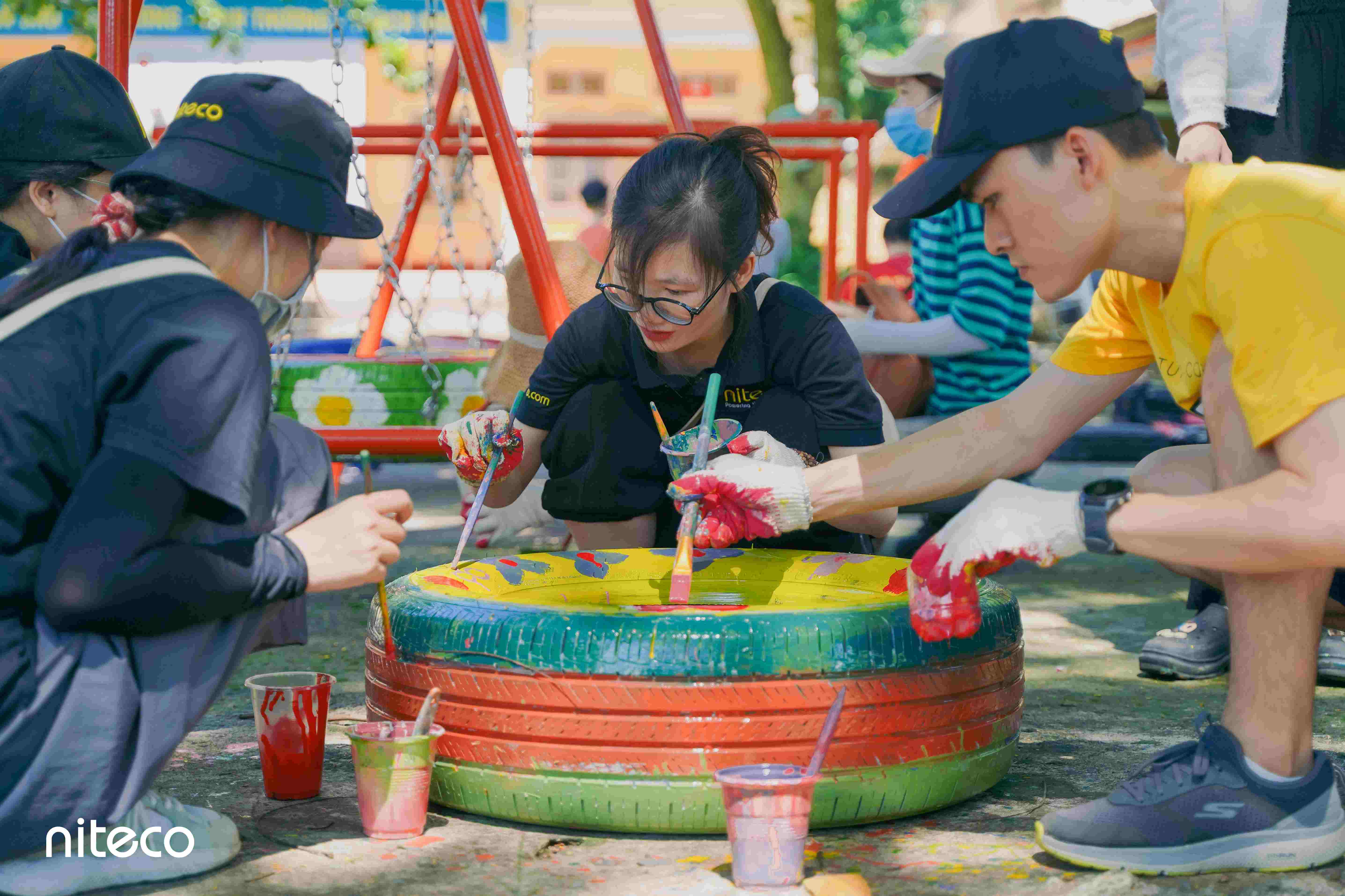Niteco volunteer creating coloring materials for children