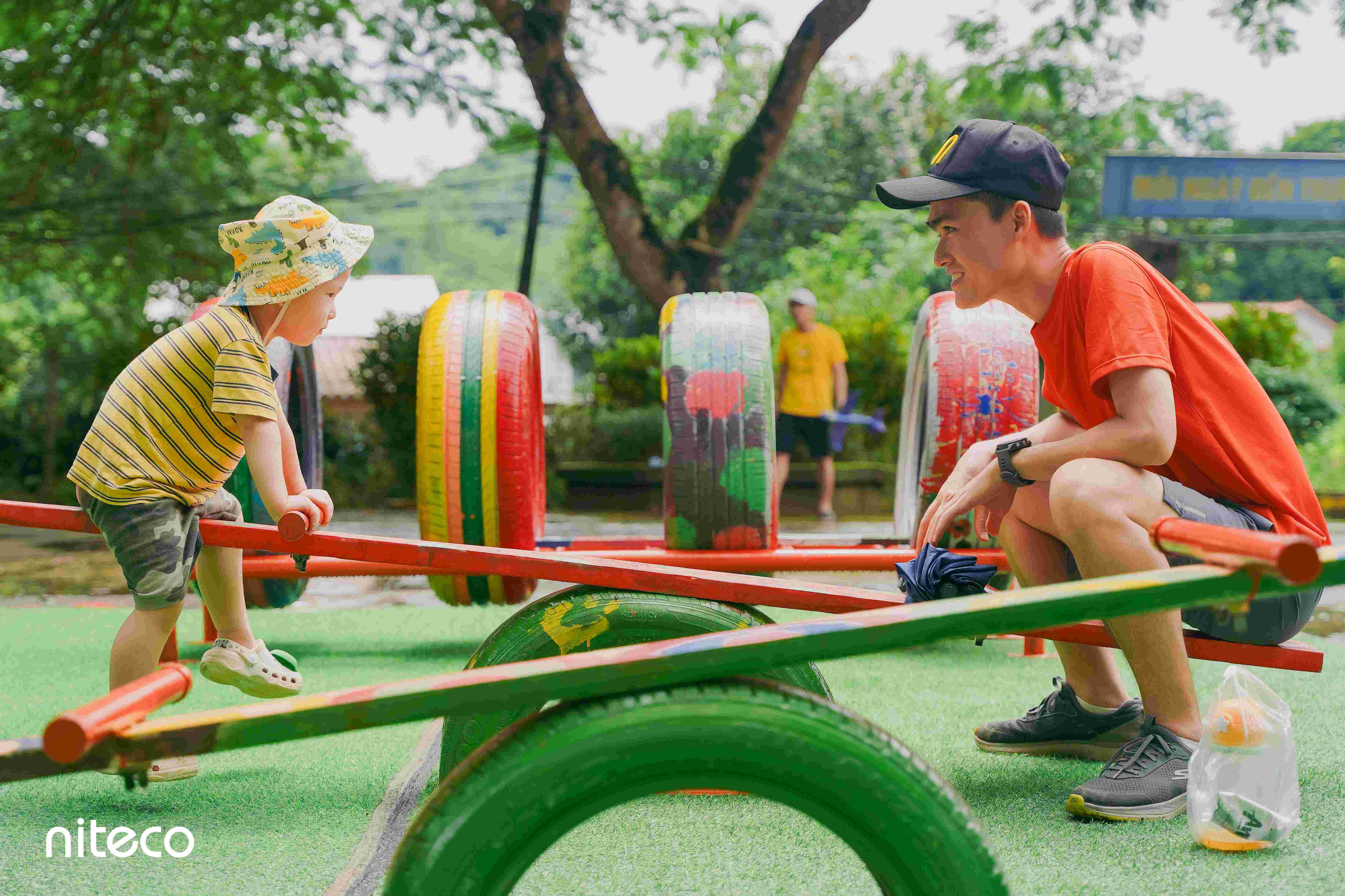 Children playing on new playground structures
