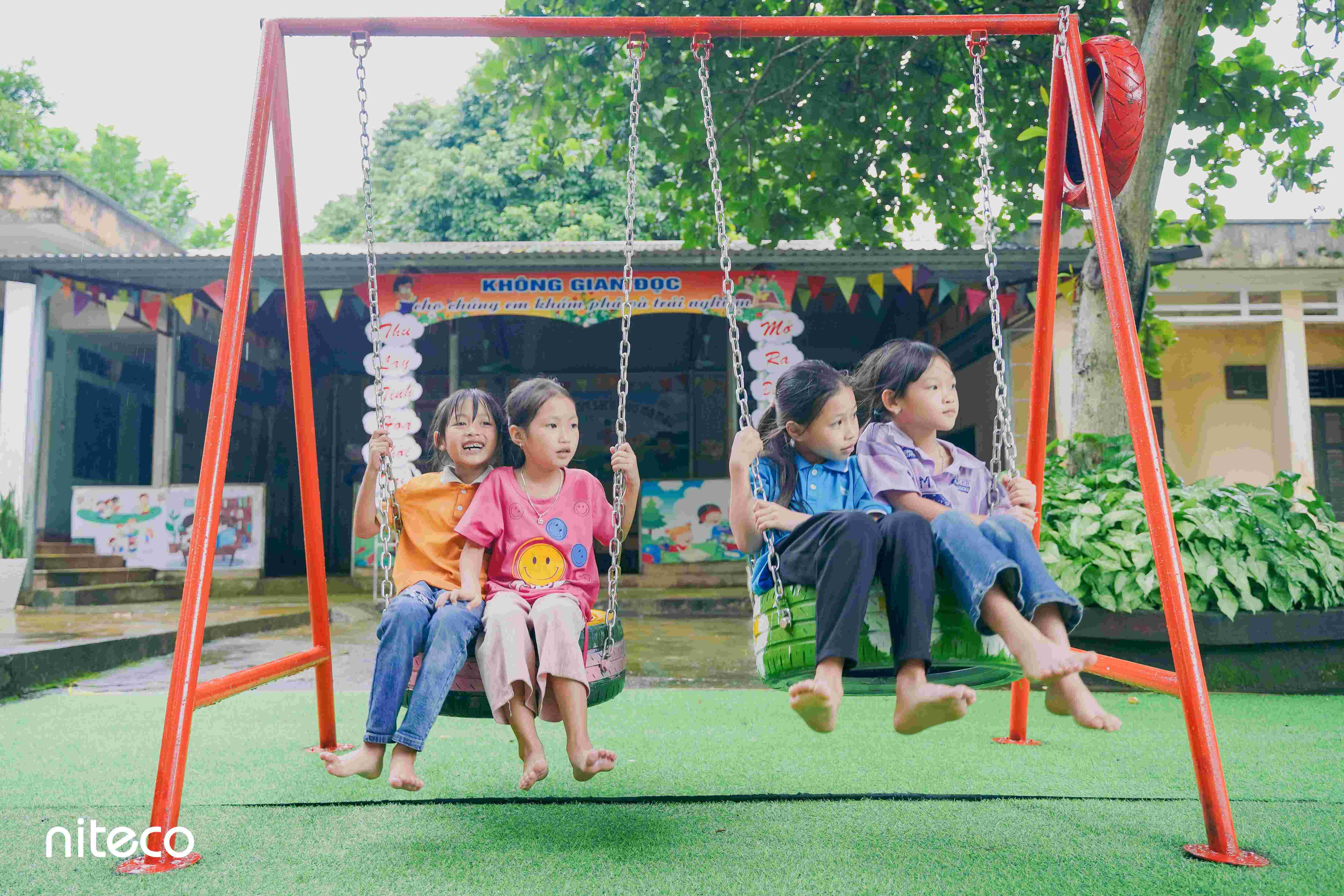 Children playing on newly built school playground
