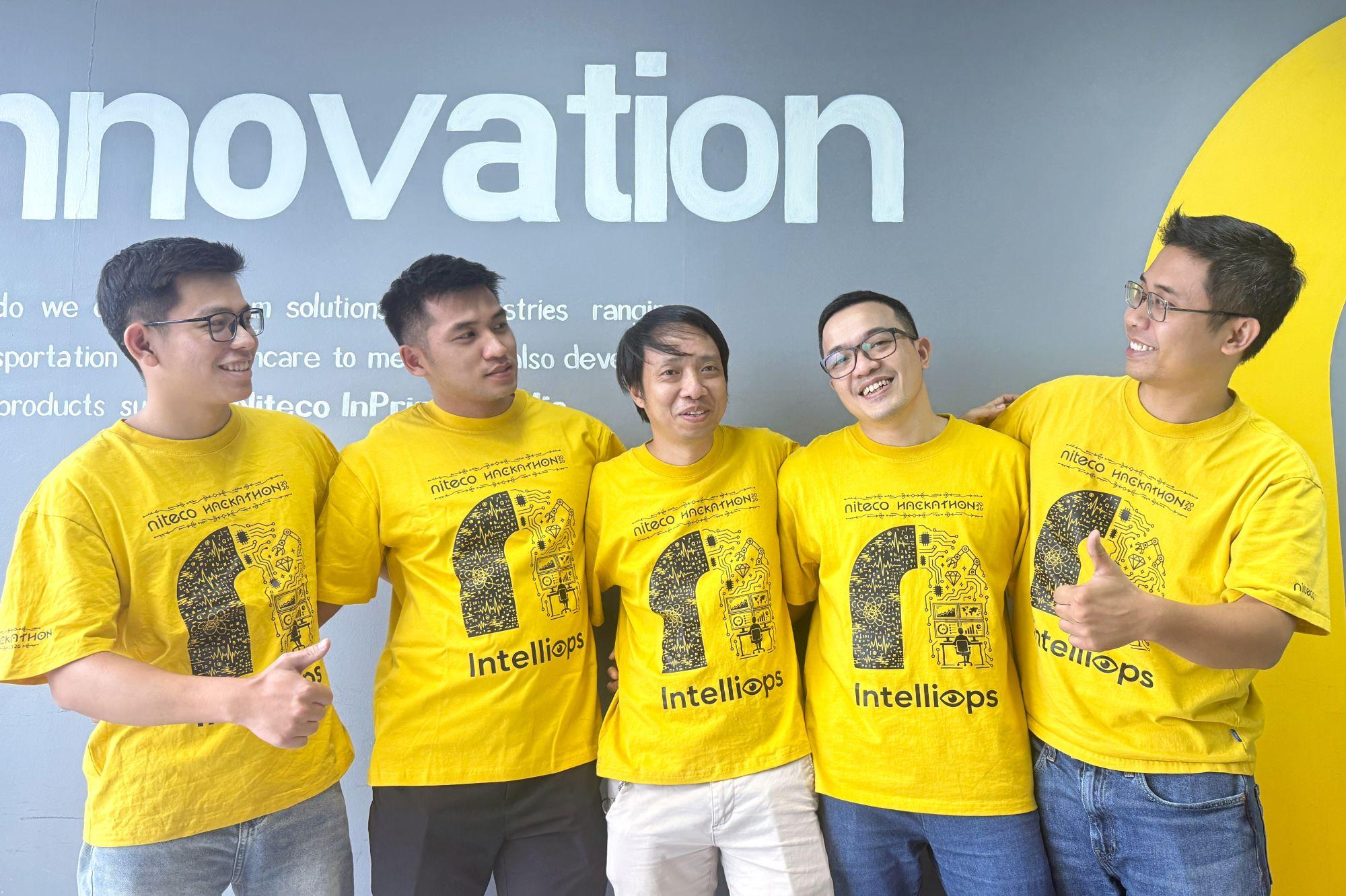 IntelliOps team members celebrating their second-place result at the Niteco AI Hackathon 2026
