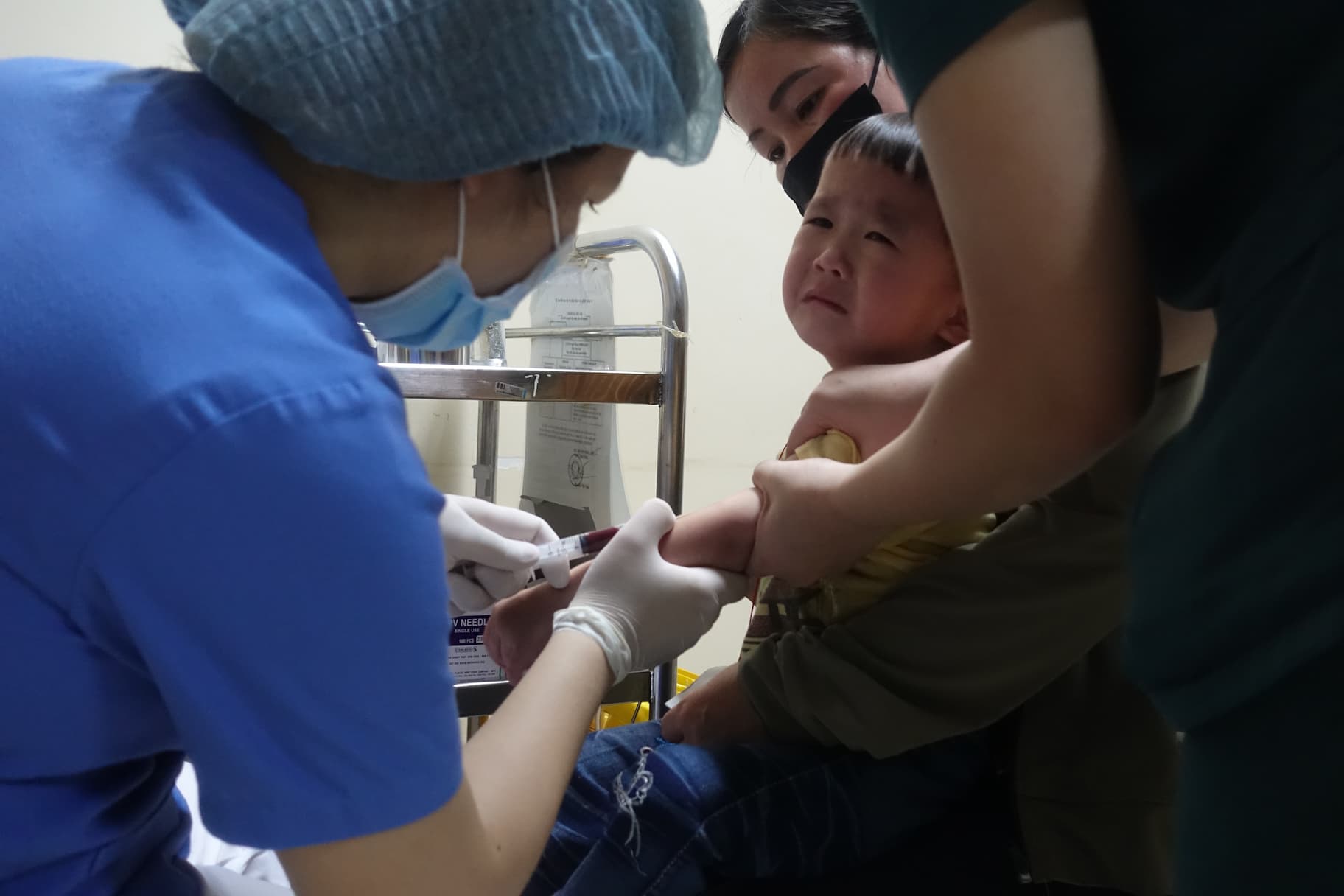 Child receiving medical examination for cleft palate