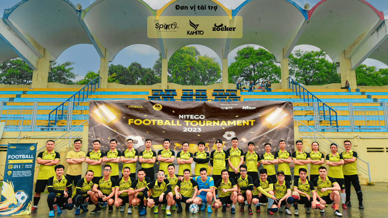 Niteco Football Tournament 2023 team photo at local stadium stands