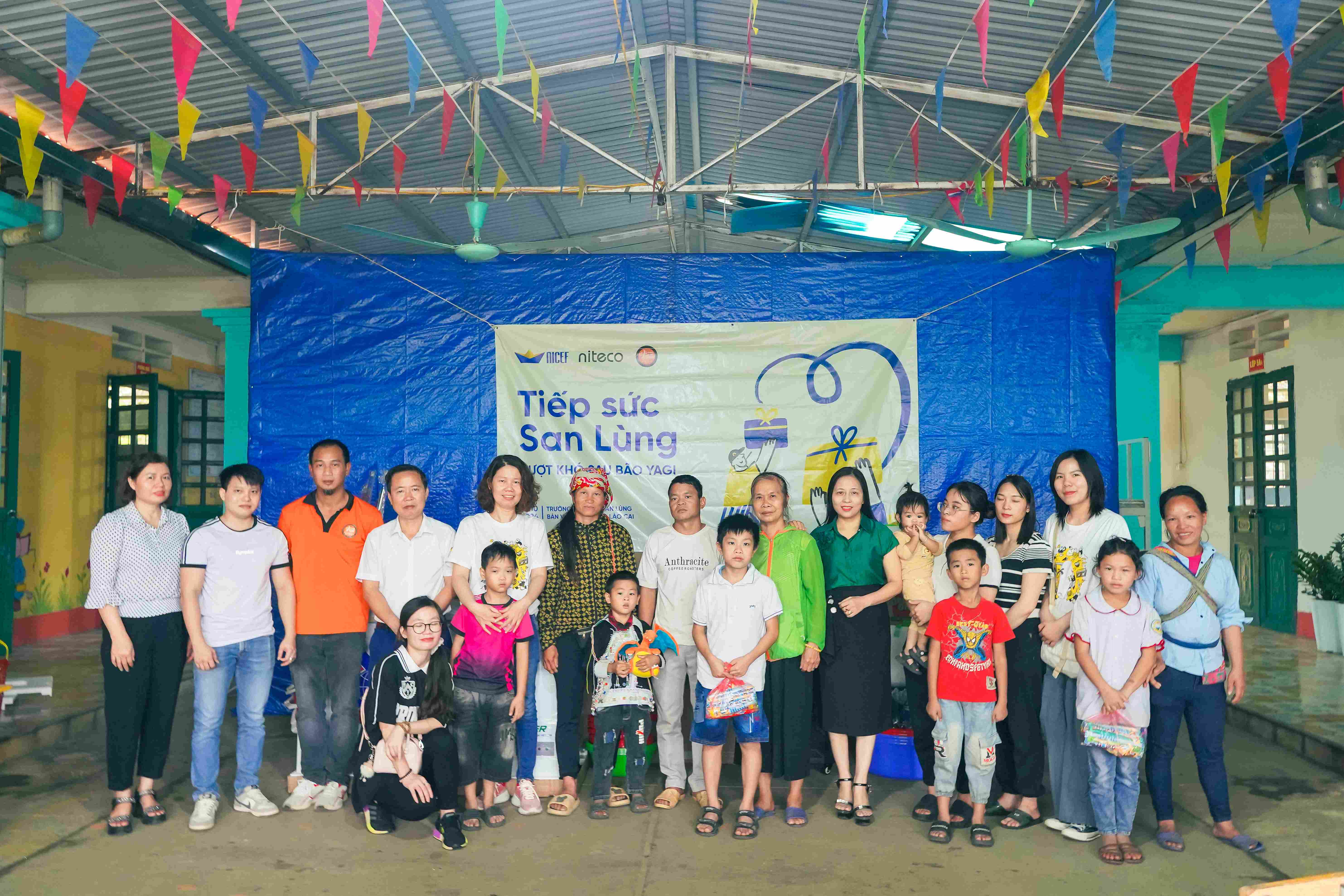 Volunteers with staff during visit