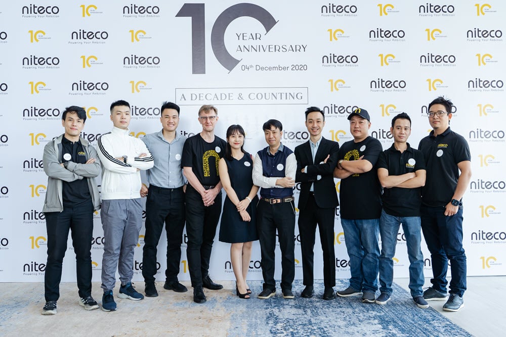 Group photo of Niteco employees at event