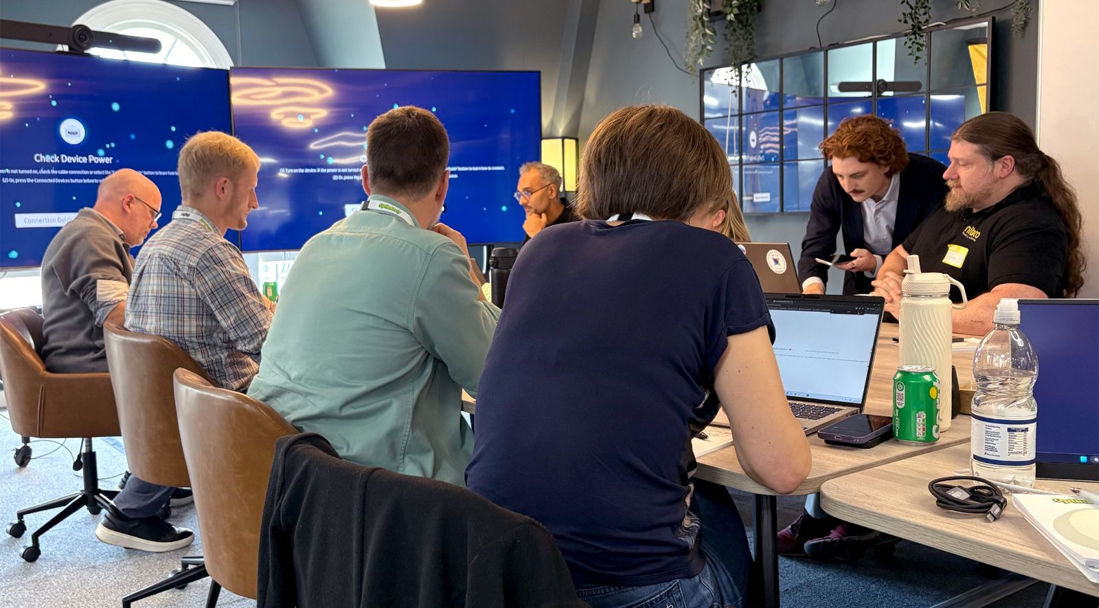Attendees building agents at their tables with the Niteco team at the first masterclass