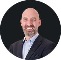Smiling professional man in suit representing leadership and business expertise