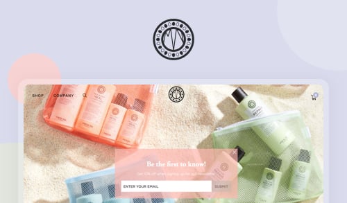 Skincare products neatly arranged in colorful mesh bags on a soft towel background